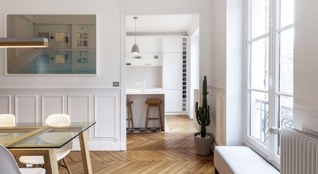 Aménagement d'un cuisine ouverte dans un salon par un architecte à Annecy