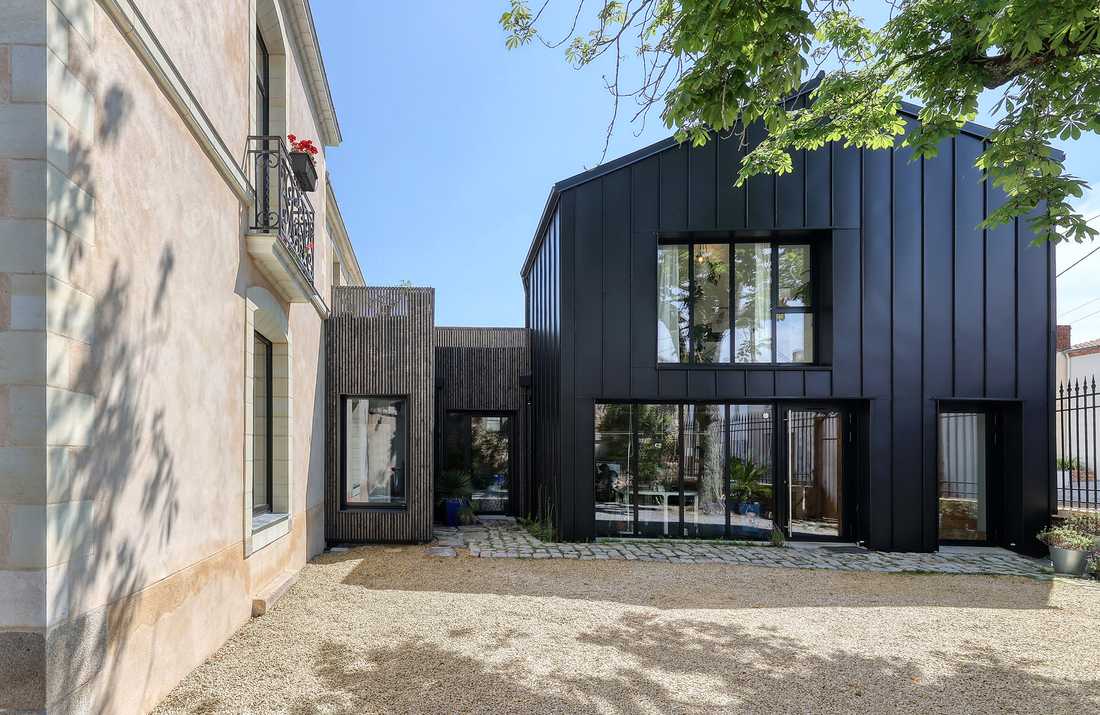 Extension d'une maison ancienne du 19e siècle par un architecte d'intérieur à Annecy