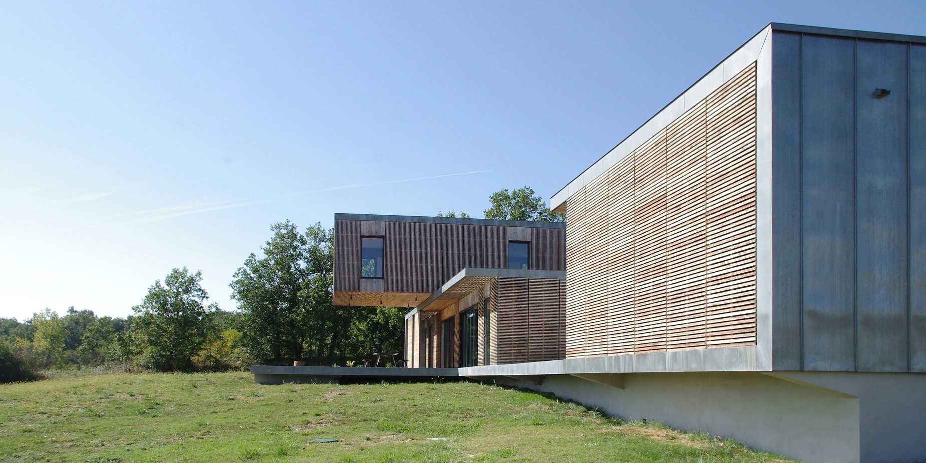 Maison contemporaine bois et beton réalisé par un architecte en Haute-Savoie (74)